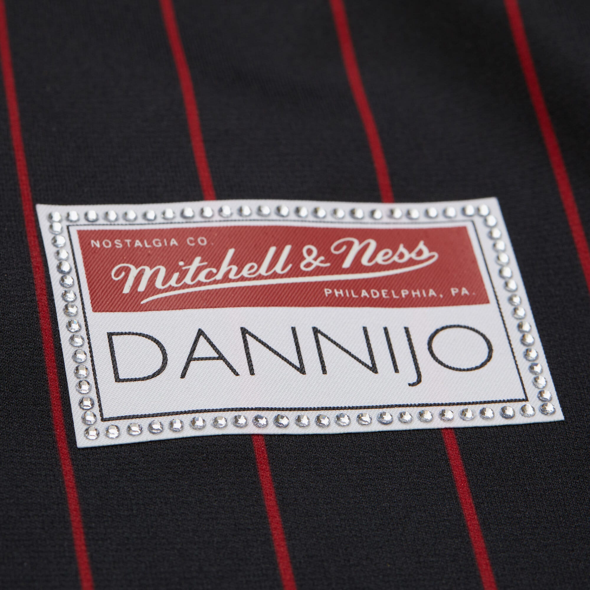 Dwyane Wade Miami Heat Mitchell & Ness x DANNIJO Women’s Cropped Football Fashion Jersey – Black Clowdercats